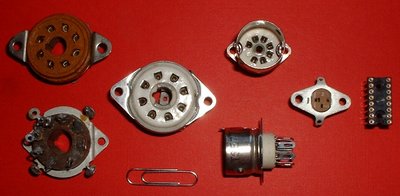 Left to right: octal (top and bottom view), loctal, and miniature (top and side view) sockets. An early transistor socket and an IC socket are included for comparison.